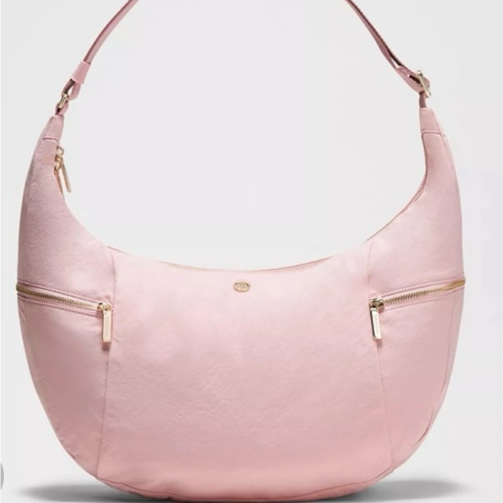 Lululemon PINK HAZE slouchy sling 13L metal hardware
